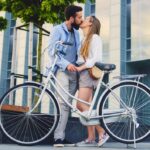 attractive-couple-date-after-bicycle-ride-city-man-kissing-woman_613910-9793